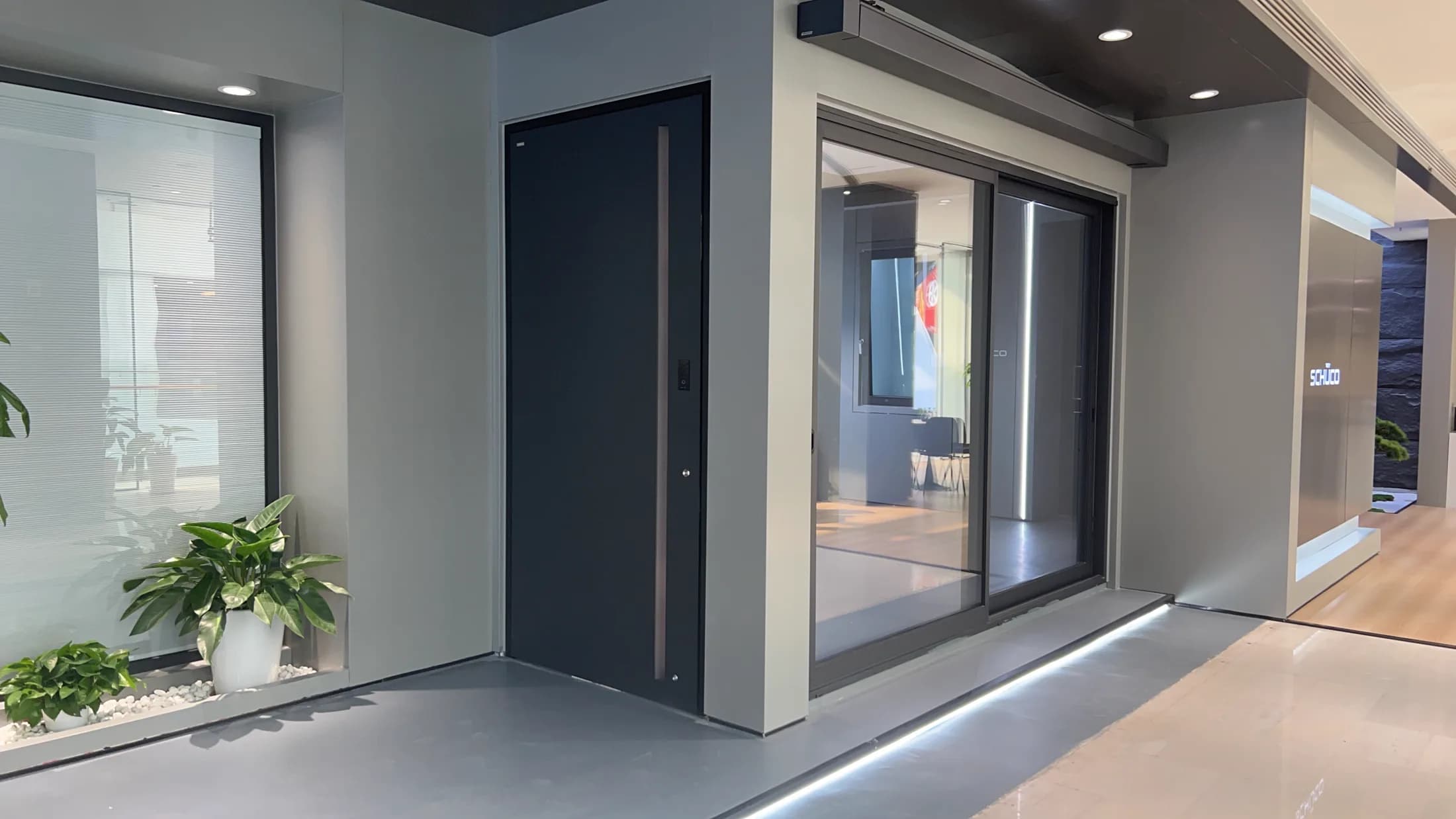 Full-size window and door displays inside a Shanghai showroom